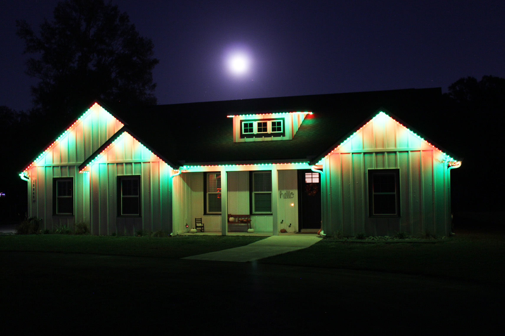 Permanent Christmas lights in red and green on a home in The Villages